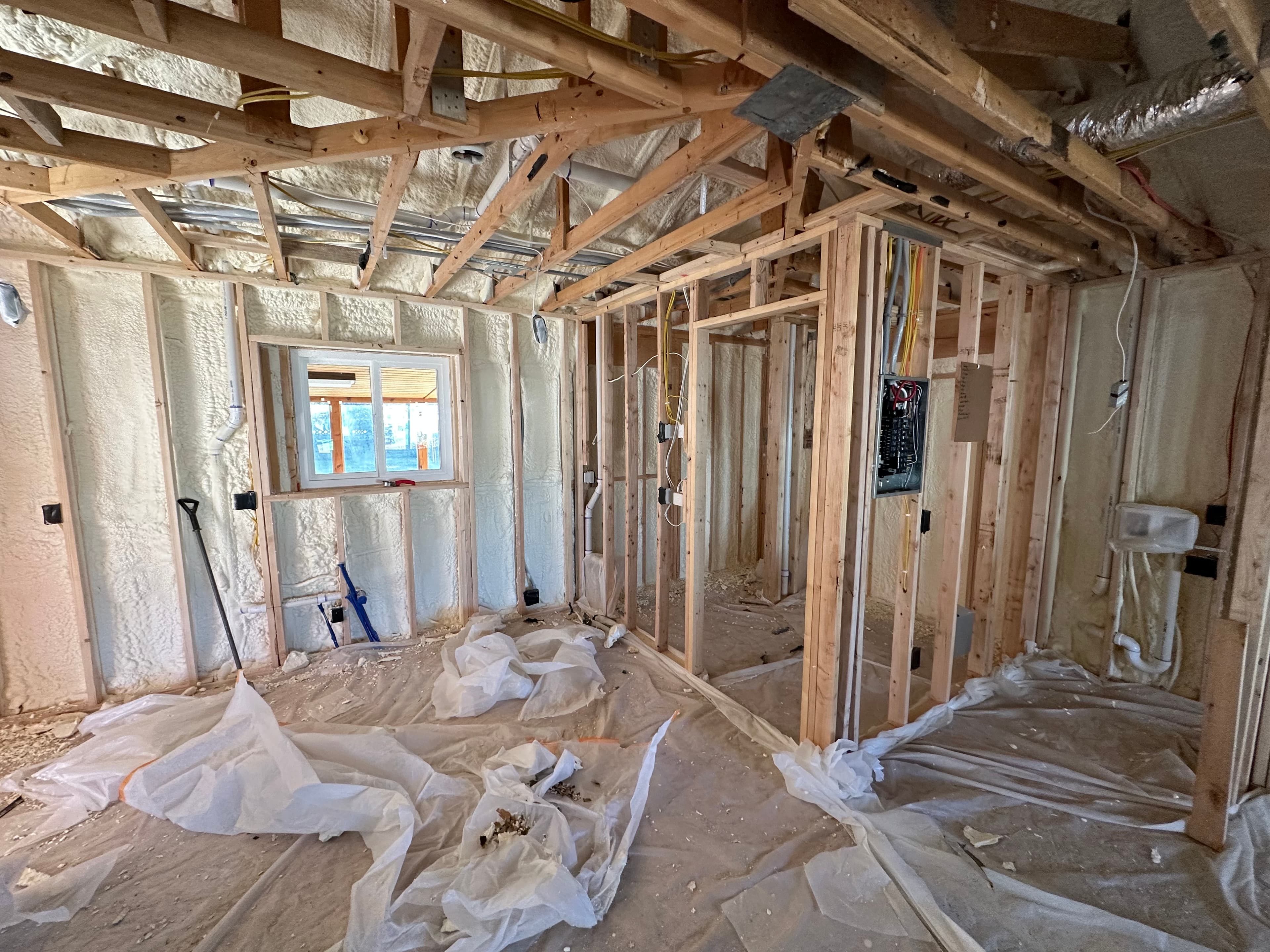 Spray foam insulation installed in the walls and ceiling of a detached ADU